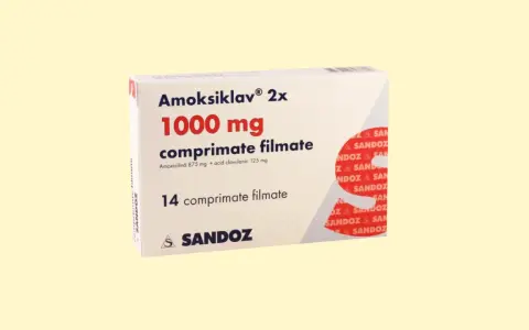 Amoksiklav 1000 mg, czy to silny antybiotyk? Opakowanie leku z 14 tabletkami powlekanymi, zawierające amoksycylinę i kwas klawulanowy.